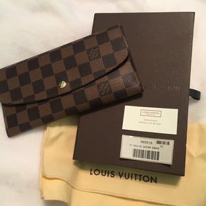 100% Authentic Louis Vuitton Emilie Wallet.